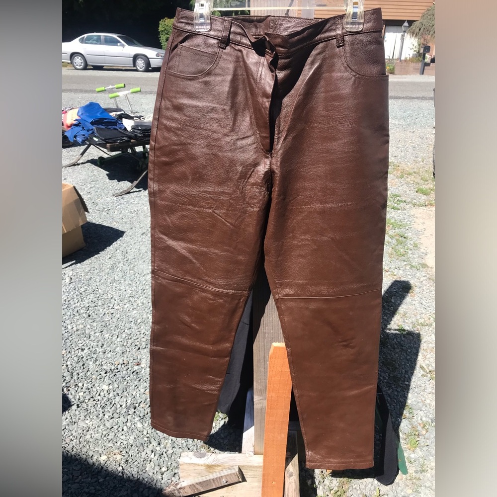 Like new but have been worn. Was stored in a home that person smoked